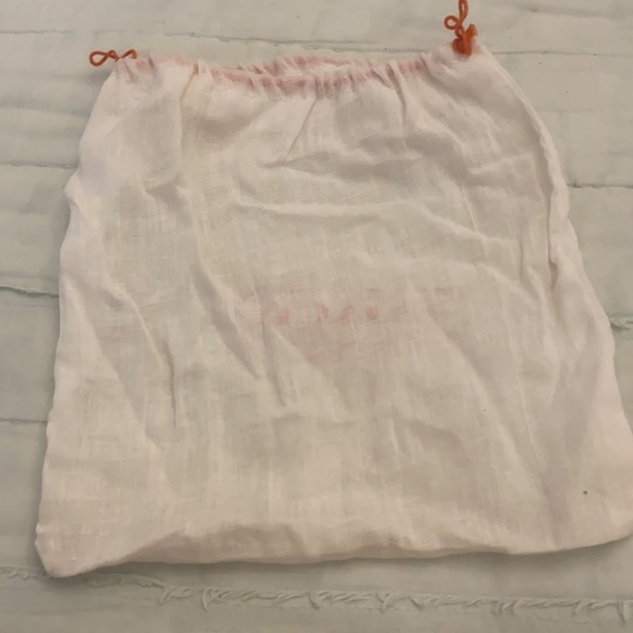 Coach bag FREE WITH PURCHASE OF $10 or more. - Picture 2 of 3